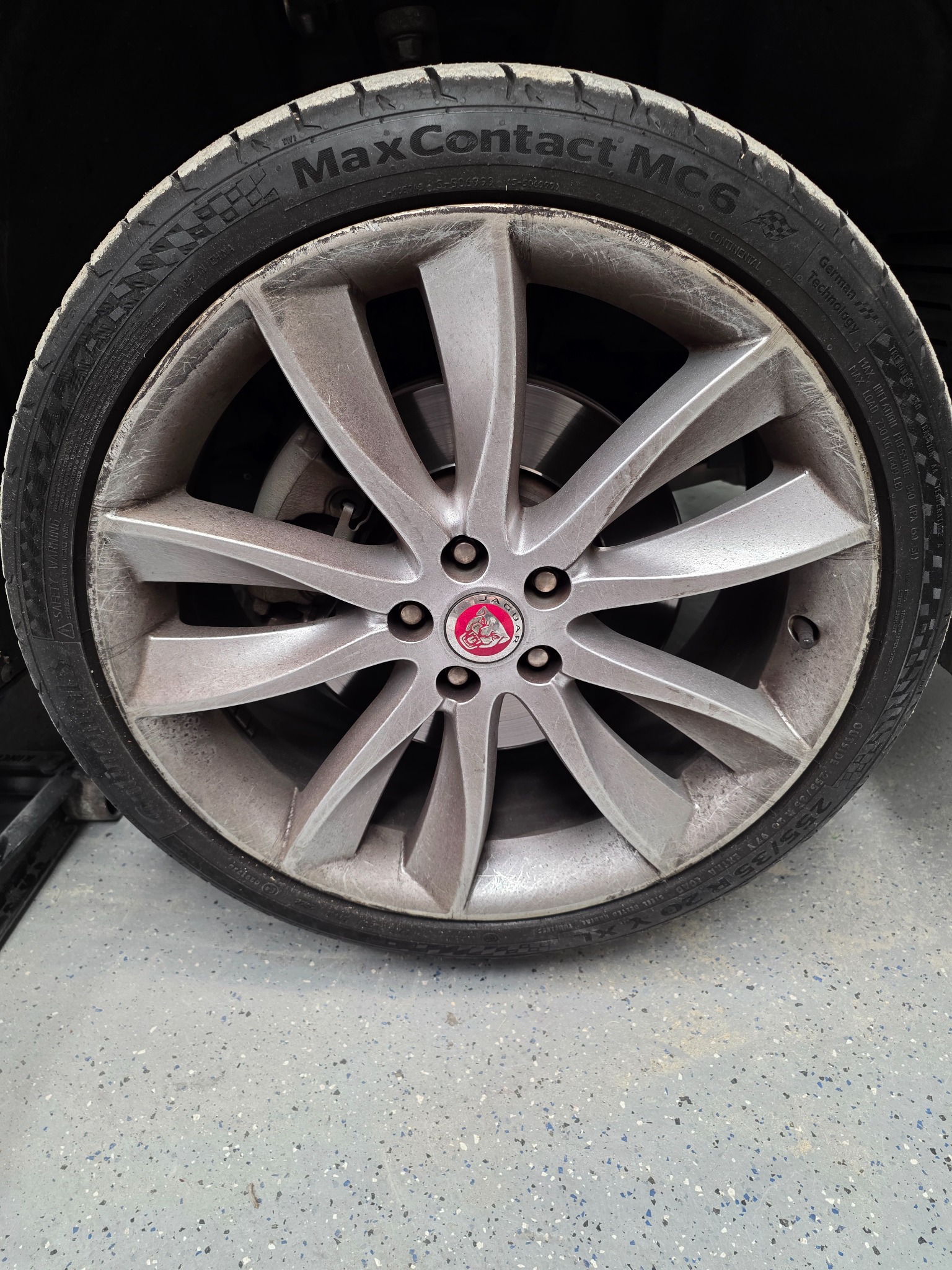 Jaguar rim before repair with cosmetic damage